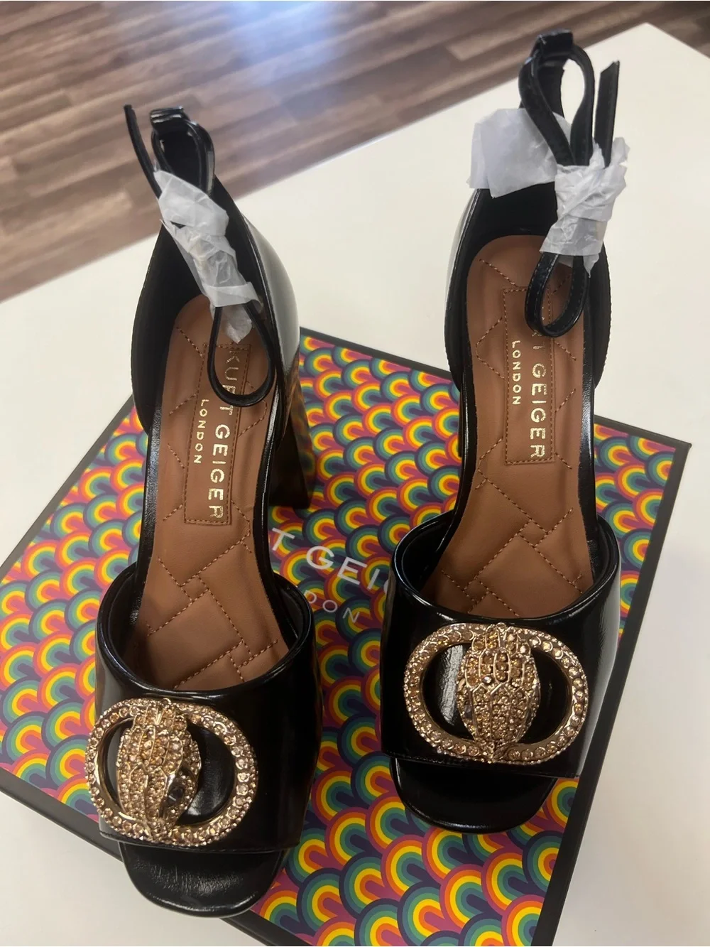 Kurt Geiger Black Patent Platform Sandals with Gold Crystal Medallion